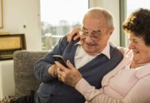 Unlock Big Savings: The Best And Cheapest Cell Phone Plans For Seniors Senior couple using smartphone at home
