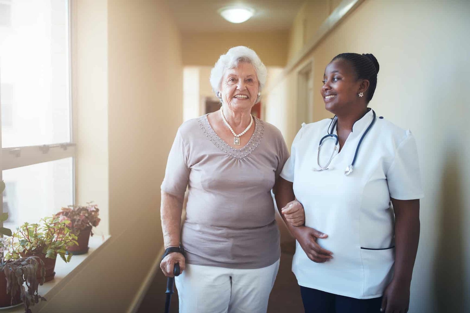 happy doctor and patient together at nursing home 2021 08 26 19 58 19 utc