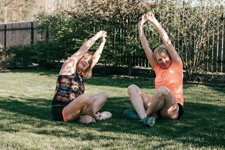 Learn all about the Big Four Cancers and more from The Authorities 9 two senior women 55 59 years in sportswear on grass perform stretching during yoga class on summer t20 8gW0pJ